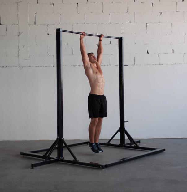 LEG RAISES TO THE BAR Grip the pull up bar with your hand a little wider than the shoulder-width apart.