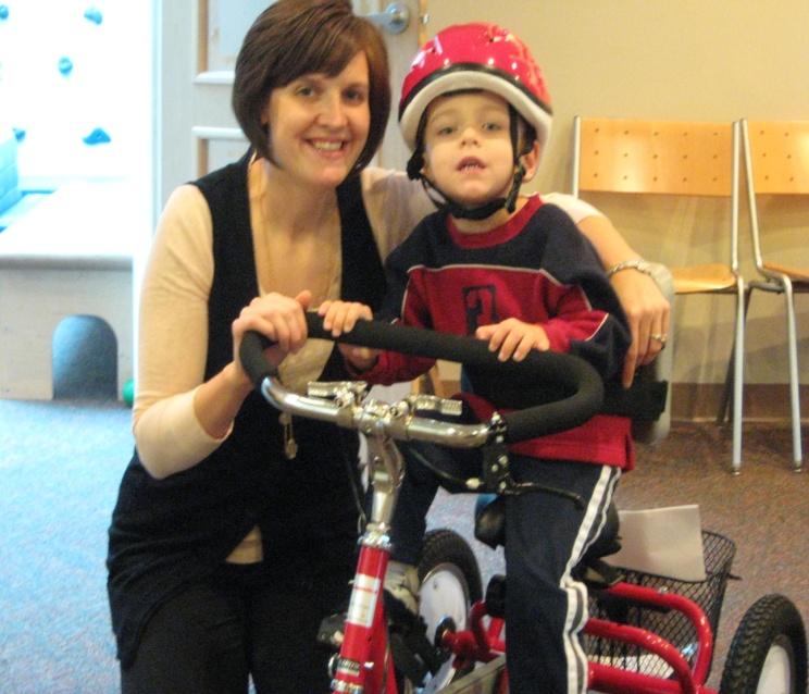 After the forty- five minute training session, the therapists assisted in evaluating ten beautiful children for their own therapeutic bicycles.