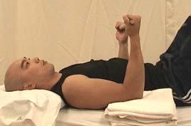 to bring the arm overhead, slowly lower the arm back to the bed.