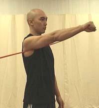 Slowly raise the shoulders in a shrug (toward the ears), then rotate the shoulders backward in a circular motion, and finally down to the original position.