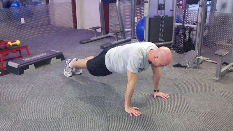 Workout A Spiderman Pushup Keep the abs braced and body in a straight line from toes (knees) to shoulders.