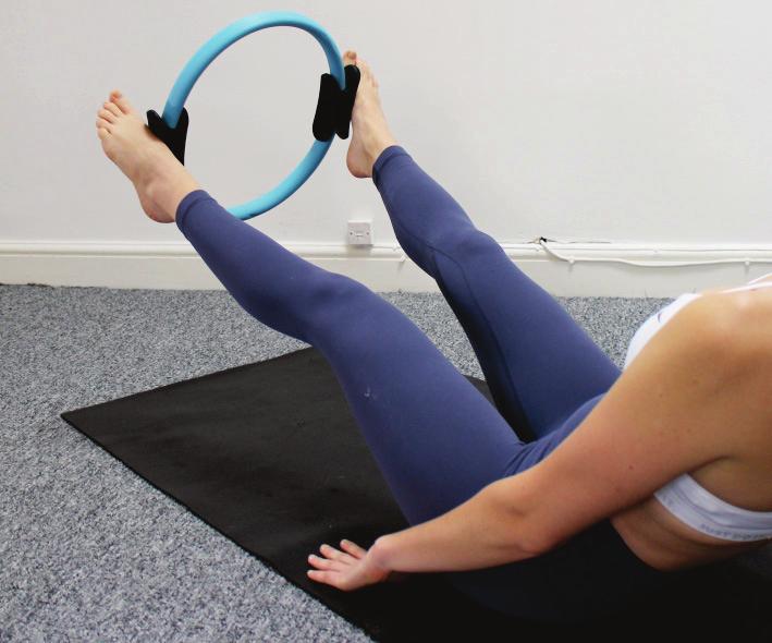 HOW TO USE Pilates ring V-Sit Hold If you've ever held a V-sit, then you know how challenging it is for your core.