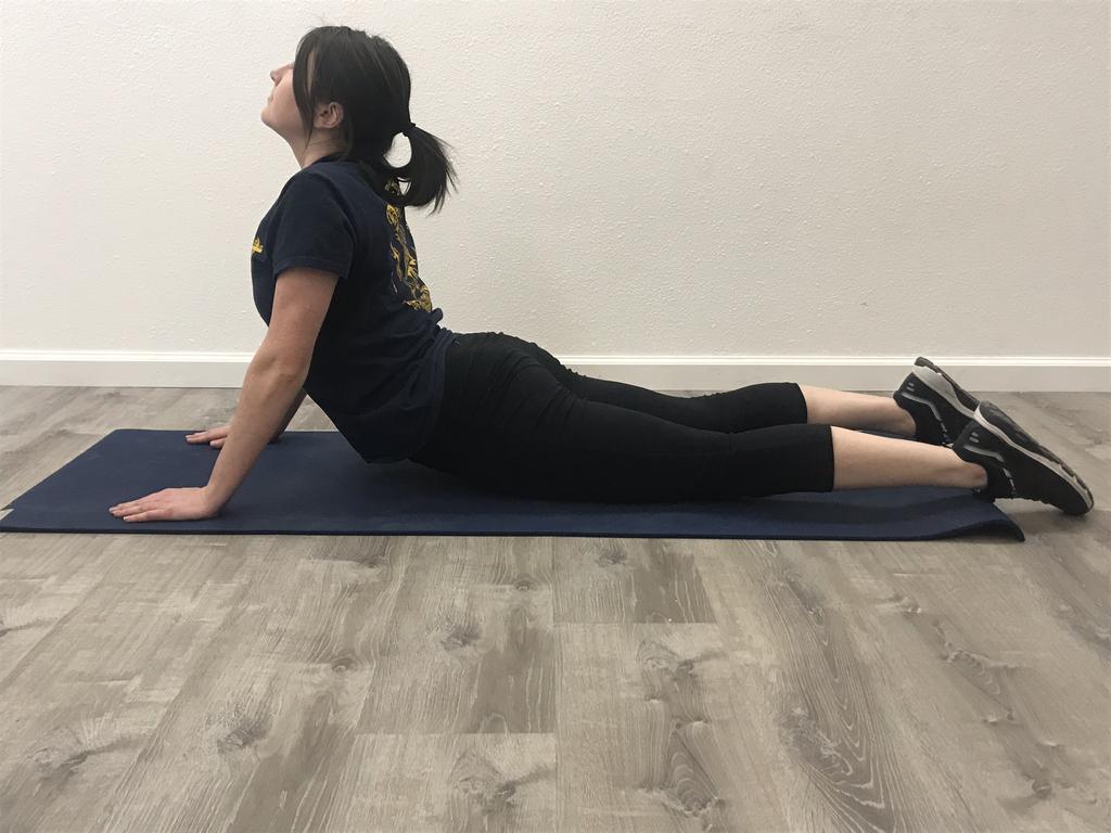 This pose stretches muscles in the abdomen, chest and shoulders and can be done after the planks, abdominal crunches and twists.
