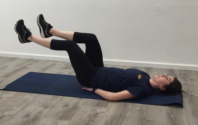 Remember to breathe while scissoring the legs. If the lower back begins to lift off the floor, raise the legs higher until core strength is gained to keep the back pressed firmly to the floor.