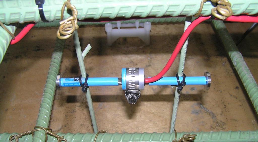 3.3.4. Joints Figure 3.7. Installed embedded strain gauge in the approach slab form The approach slab was instrumented with eight Geokon Model 4420 Vibrating Wire Crackmeters.