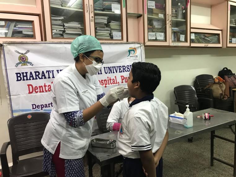 The Department of Public Health Dentistry organized and conducted a free dental check up and health awareness camp at Pune Cambridge Public
