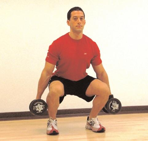 Start by sitting backwards with your hips until your upper thighs are parallel to the