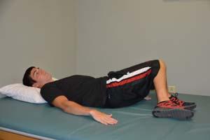Exercise 3: Hip Rolling Starting Position: Lie on your back on a table or firm surface. Both knees bent, feet flat on the table. Action: Cross your arms over your chest.