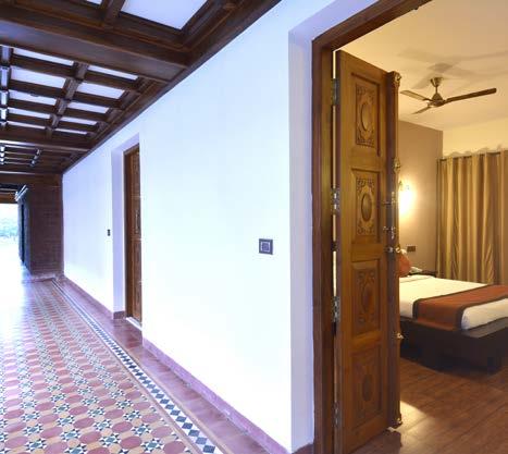 Built in trademark Kerala style featuring elaborate wood work, exquisite masonry, intricate carvings, stately furnishings, winding verandas and the signature open central courtyards.