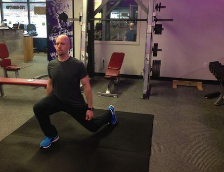 Alternating Diagonal Lunge Stand with your feet just outside shoulder width apart.