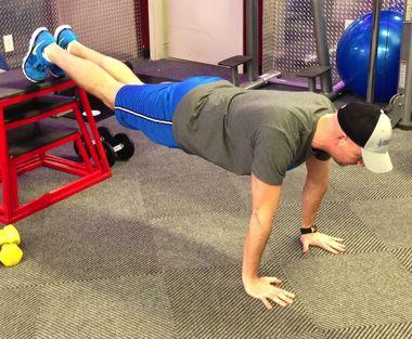 abs braced and body in a straight line from toes (knees) to shoulders.
