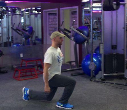Workout D Switch Lunge Stand with your feet shoulder width apart, holding dumbbells at your sides