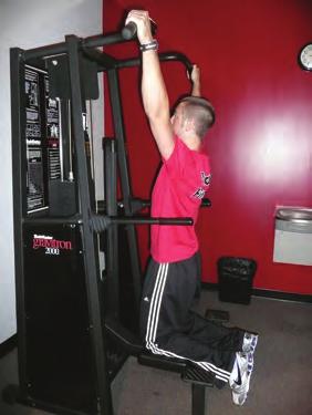 assisted pull up With knees on pad, extend arms all the way