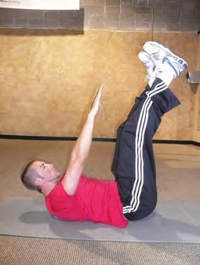 TOE TOUCHES Start in same position as crunch except legs are vertical