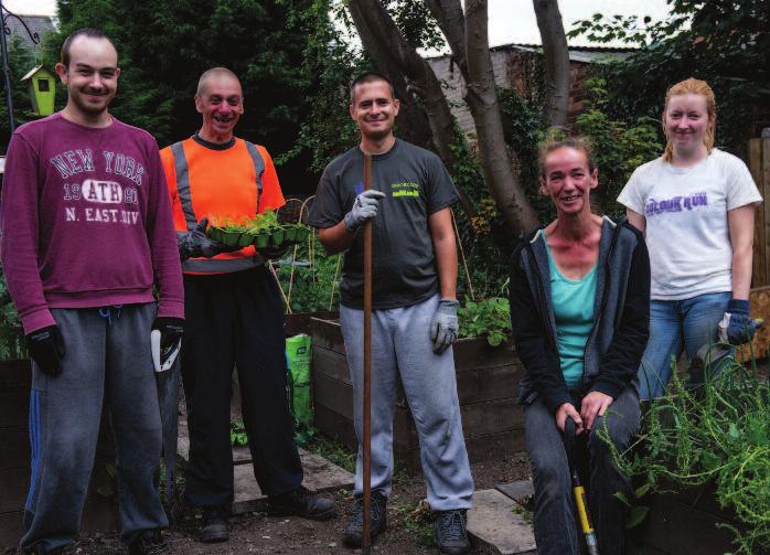 Volunteers from the community preparing a property to be let in Hull, UK.