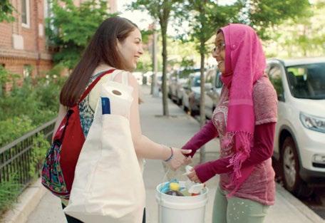Shumi helps Gabriela carry her bags. Shumi asks Gabriela, Is it safe for immigrants to go to a food pantry?
