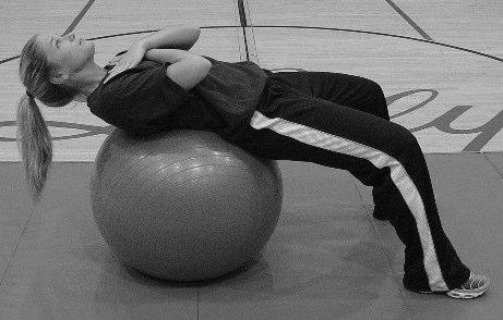 Lie supine position on ball with arms crossed over chest.