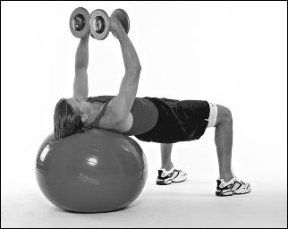 114 Part II: Workouts to Have a Ball With a Figure 8-3: Flies on the ball. b Complete two sets of 10 to 15 repetitions.