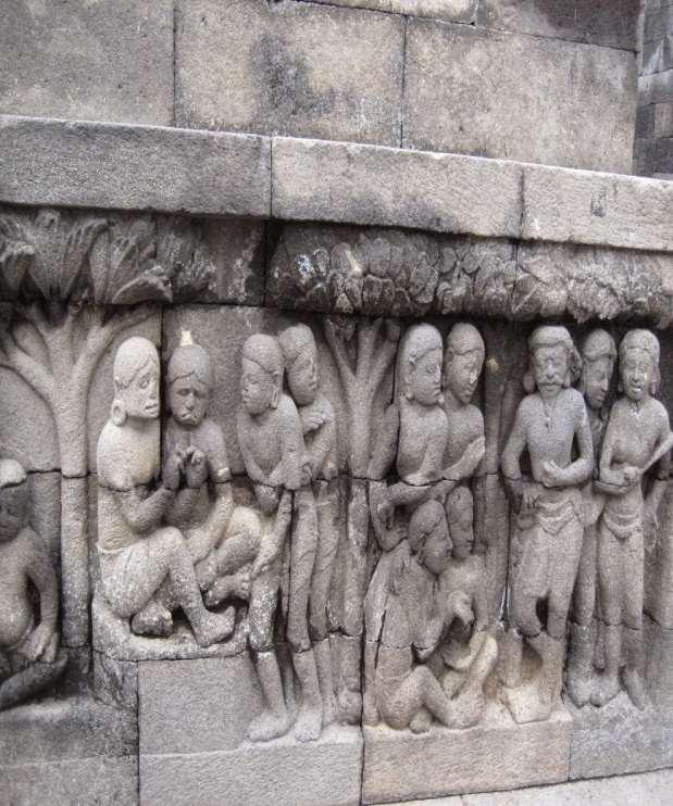 A famous stone relief of the Buddhist temple of the Borobudur located in Mid-Java, rediscovered after the restauration in 1814, depicting a scene of the