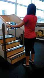 D. Standing step taps: Patient stands facing step and engages core musculature.