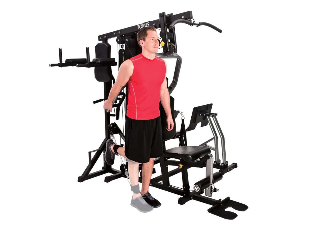 STANDING LEG EXTENSION 7 1. Adjust the free-motion arm to the upward position and attach ankle strap. 2. Stand beside the machine with the cuff on your right ankle and hold your hand on the press arm.