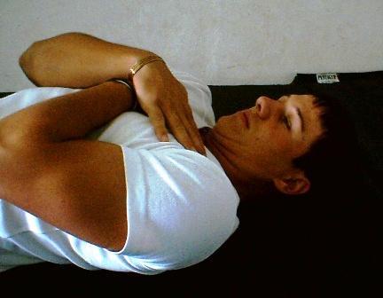 Strengthening and Re-establishing Neuromuscular Control Deep Neck Flexors Lie on the back with the arms by the side, with a small rolled-up towel in the hollow of the neck.