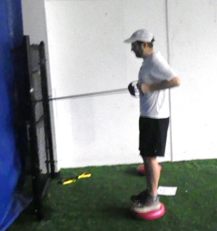 Close Row on Discs Stand with knees softened, core engaged to hold neutral spine alignment Keeping elbows close to body, lead with elbows and squeeze shoulder blades together pulling against rubber