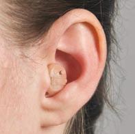 The open ear hearing aid consists of a miniature behind-the-ear (BTE) hearing device coupled to an ultra thin tube with a soft rubber tip that fits in the ear.