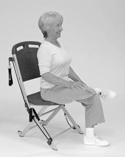 Seated Hip Stretch Goal: To stretch hip muscles. 1. Sit upright at the front of the chair with your right ankle resting on your left knee (). 2.
