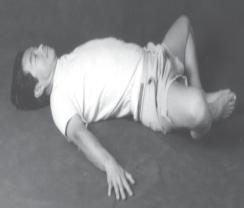 Loosening the Psoas Muscle: Lie on your back, lift your knees up, put the soles of your feet together and hold them together with your hands (if you are unable to reach your feet, you can grasp
