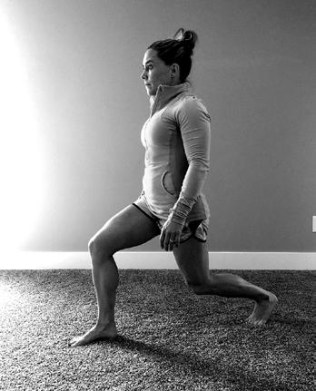 2 While tightening your butt push through the front heel to raise yourself out of the lunge.