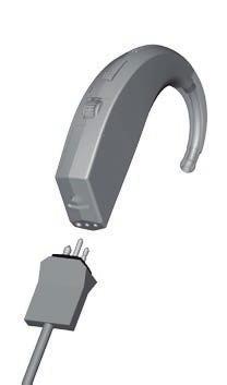 Insert the Euro plug of the assistive listening device into the DAI port on the bottom of the hearing aid.