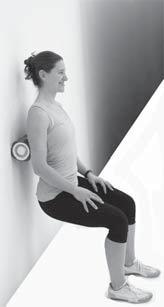 Lean as much or as little as you need in order to feel pressure, but not pain. Leaning into the roller slowly bend your knees into a squatting position.