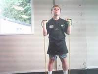 Thigh Exercises Band Squats Take a wide stance with your feet arched slightly outwards.