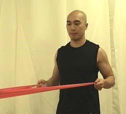 7 Shoulder Shrug Stand on the theraband with your feet at should width apart and look straight ahead.