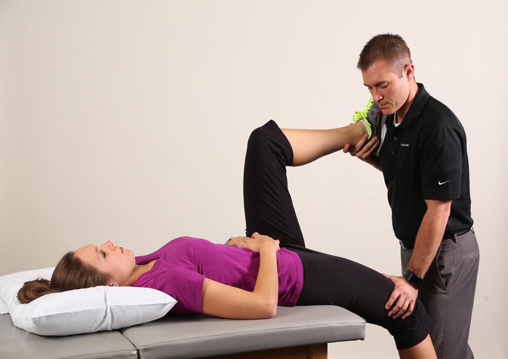 Raise your non-surgery leg to your chest by holding it behind the knee or have the therapist hold it.