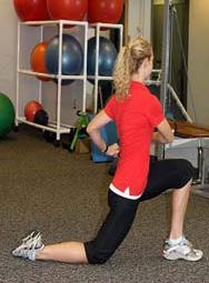 Keep your body upright. Keep core muscles in the stomach tight. Tuck your tailbone under to do a posterior pelvic tilt.