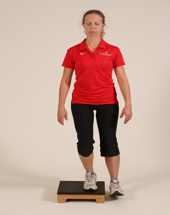 Place the band around the ankles. Step back with one foot at a 45 degree angle. Return back to the start position.