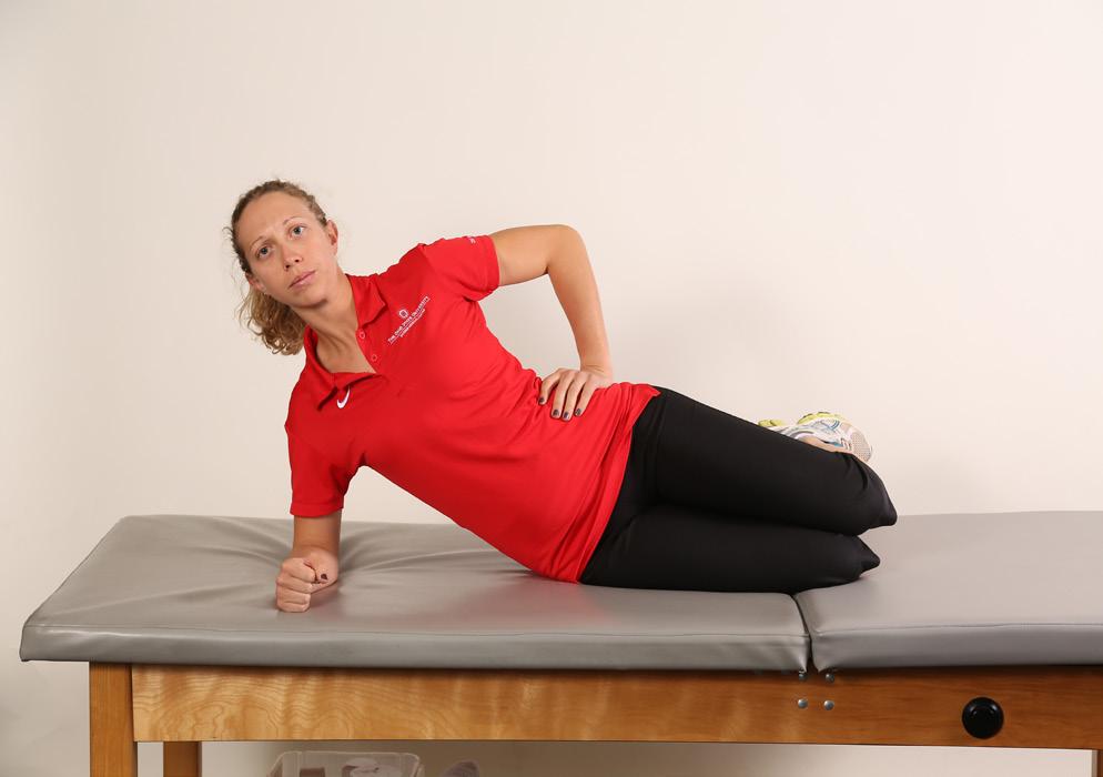 47 Modified side plank Lie on your side for this exercise. With your elbow under your shoulder, prop up your body. Place your hand on your hip. Keep your core muscles tight for this exercise.