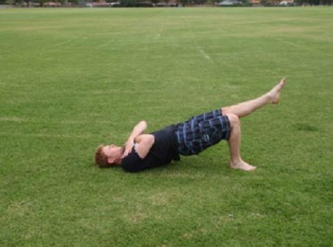 Single Leg Glute Bridge Lie on your back with your knees flexed and feet flat on the ground. Raise your hips off the ground creating a straight bridge between your shoulders and knees.