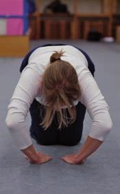 Bend through the elbows as per a push-up, and lower
