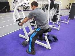 Adjust seat to comfortable position and chest pad against chest to where arms are almost fully extended to hold