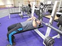 and reposition barbell over chest and start with arms