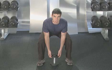 GIANT SET 2: 1. Squat with Vertical Dumbbell Pick-up - Fast x 10 reps Place the dumbbell in between your legs (not out in front).