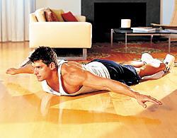 Atomic sit-up (20 Rep) Lie faceup on the floor. Raise your head and upper shoulders, and lift your legs a few inches up off the floor until your ankles are in line with your eyes.