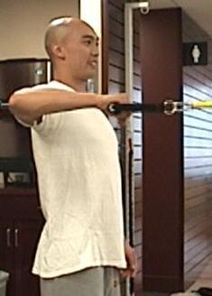 Keeping the arm elevated to 90 degrees and the elbow at a 90-degree angle, rotate the hand and arm slowly backward and then return slowly to the start