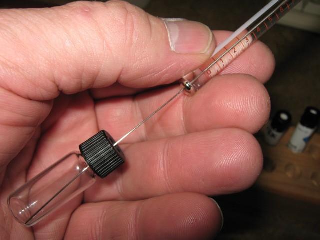 Puncture the septum rather than open the vial to avoid letting the methanol solvent evaporate each time the vial is opened.
