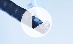 Using long strokes, brush the elevator wire side wall in the axial direction of the cleaning brush for 5 seconds, keeping the distal end of the endoscope immersed in the detergent solution.