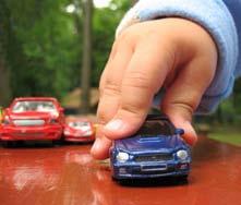 Push the toy car softly and measure the distance it travels. Your partner should mark where it stops using his/her finger. Measure using a ruler.