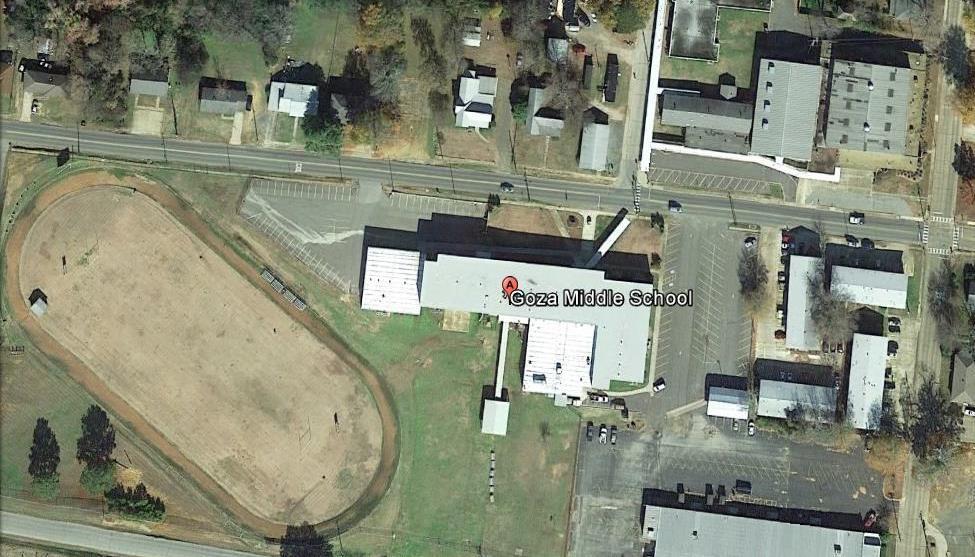 Facility Location: Goza Middle School Outlaw Gym 1305 Caddo Street, Arkadelphia, AR 71923 Volleyball/Basketball -- Yellow arrows indicate EMS route -- Yellow starred